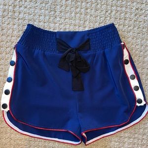 Shorts with button accents on the side